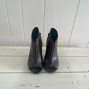 Coach brand. Slightly wear on heel. Leather booties